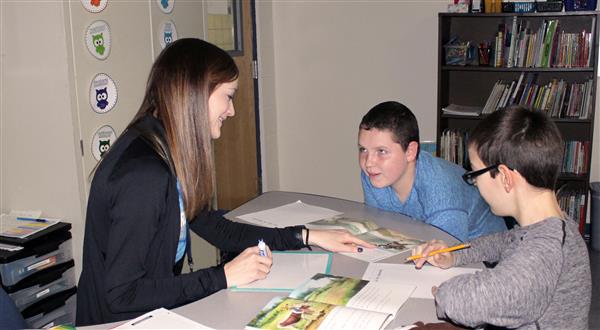 Co-teacher working with small group of students Co-teacher working with small group of students