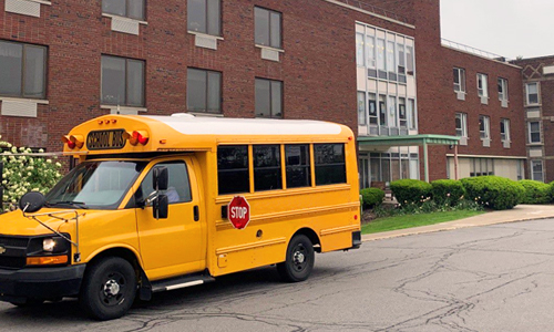 Bus outside the Fairport Baptist Home 