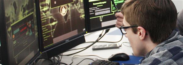 Cisco student working on computer