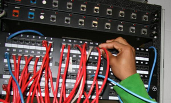 CISCO Networking Academy student works on networking CISCO Networking Academy student works on networking