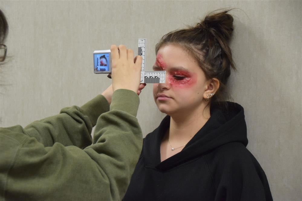 Criminal Justice students work a case. 