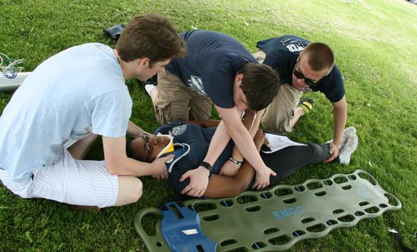 Emergency Services students practice safely moving a volunteer "patient" Emergency Services students practice safely moving a volunteer "patient"