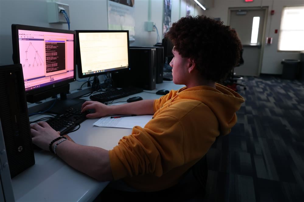 CISCO Networking Academy student works on networking