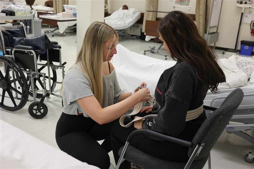Students work together on assisting patients. Students work together on assisting patients.