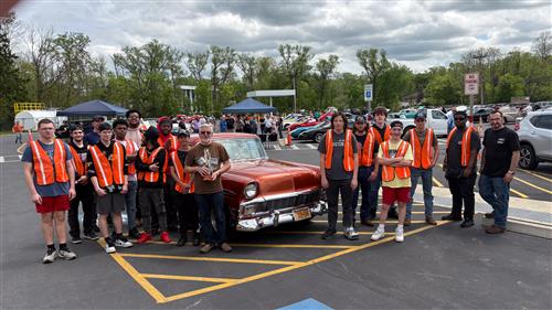 The Auto Trades class with the winner of the car show.
