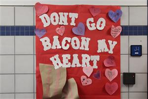 Valentine's Day door decoration reads "don't go bacon my heart."