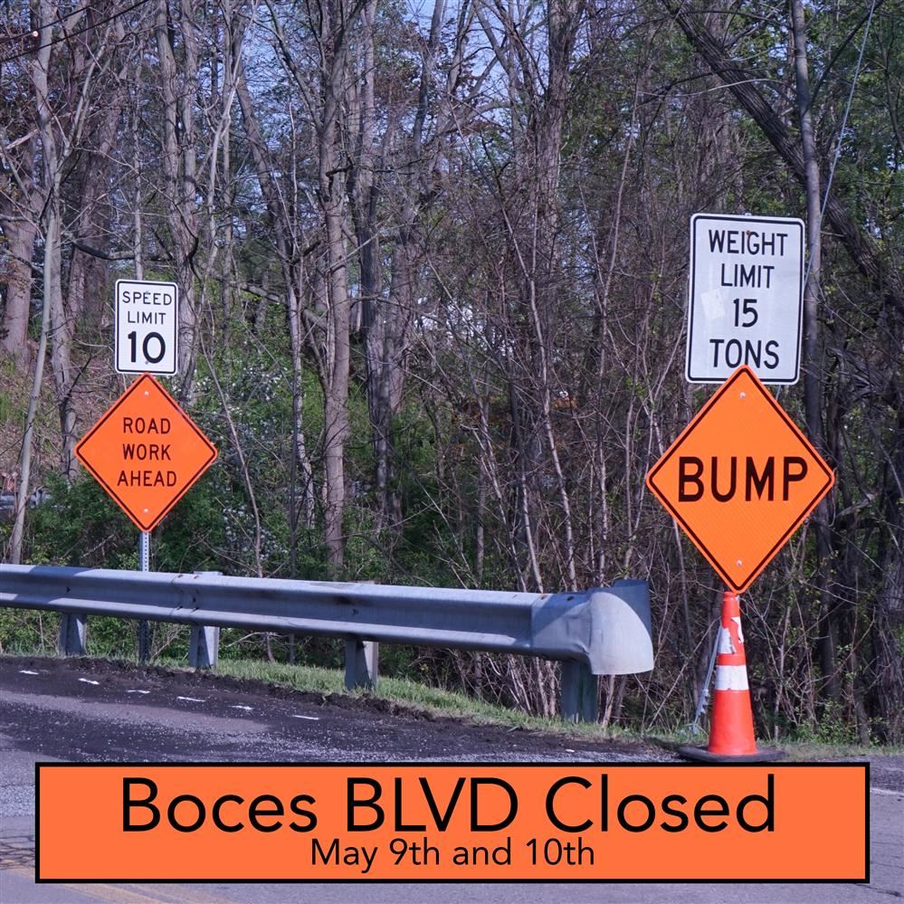  road work sign with text in orange box alerting drivers BOCES Blvd will be closed May 9-10